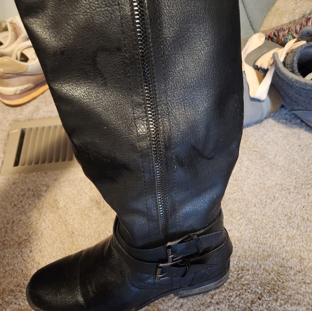 Black leather knee length boots